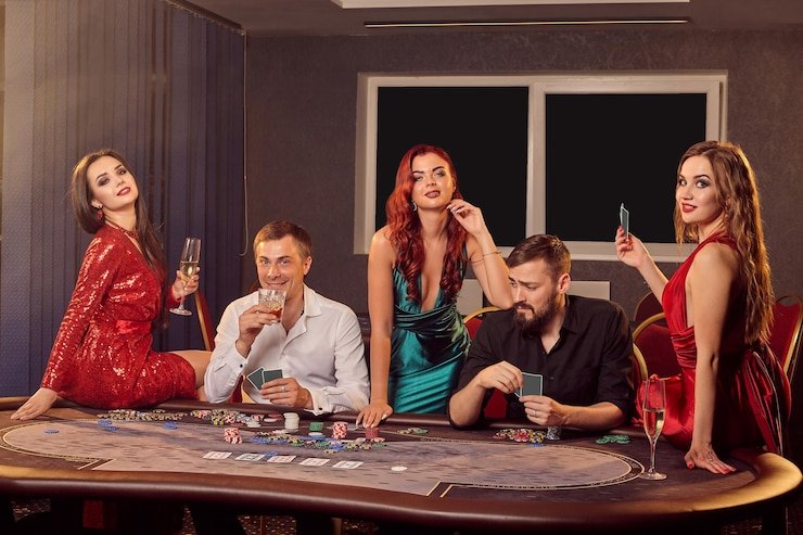 Live Bandar Poker table at top12toto with multi-camera dealer setup and player cards visible